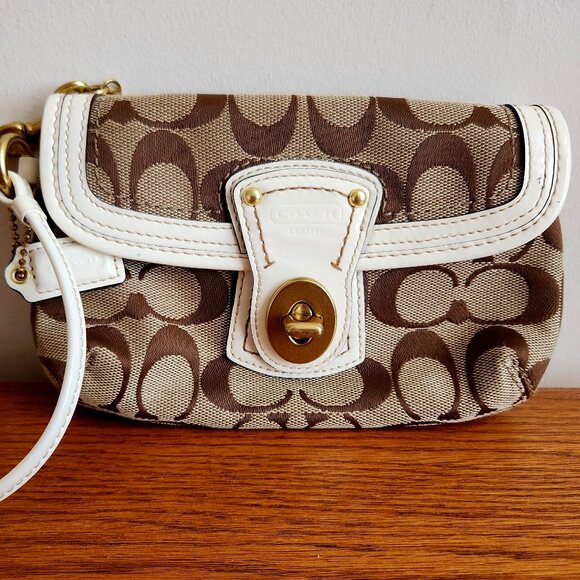 Coach Handbags - COACH LIGHT AND DARK BROWN LOGO CANVAS  AND LEATHER WRISTLET.